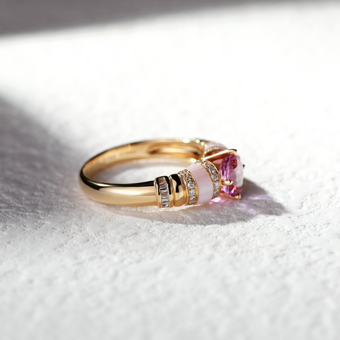 18K Gold Pink Sapphire Ring with Baguette Diamond