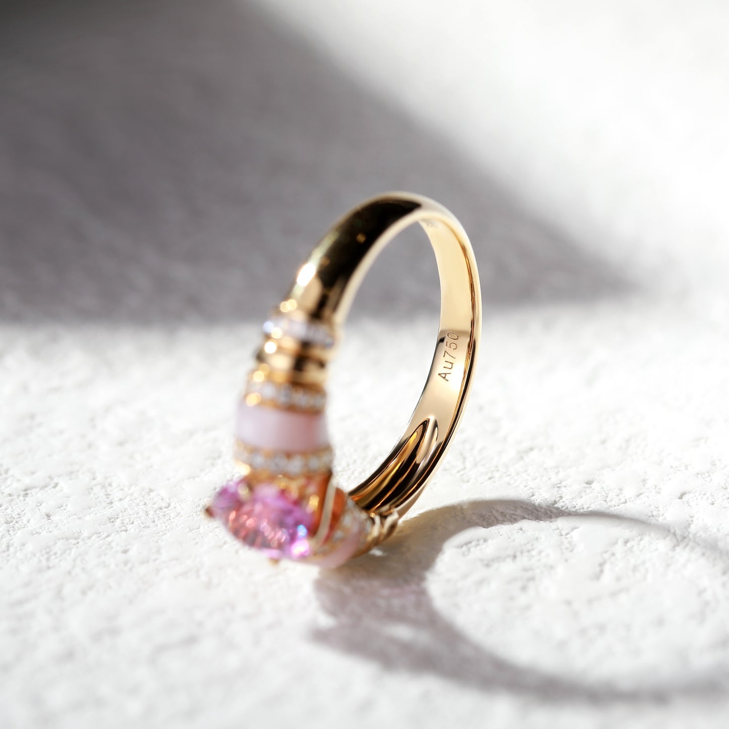 18K Gold Pink Sapphire Ring with Baguette Diamond