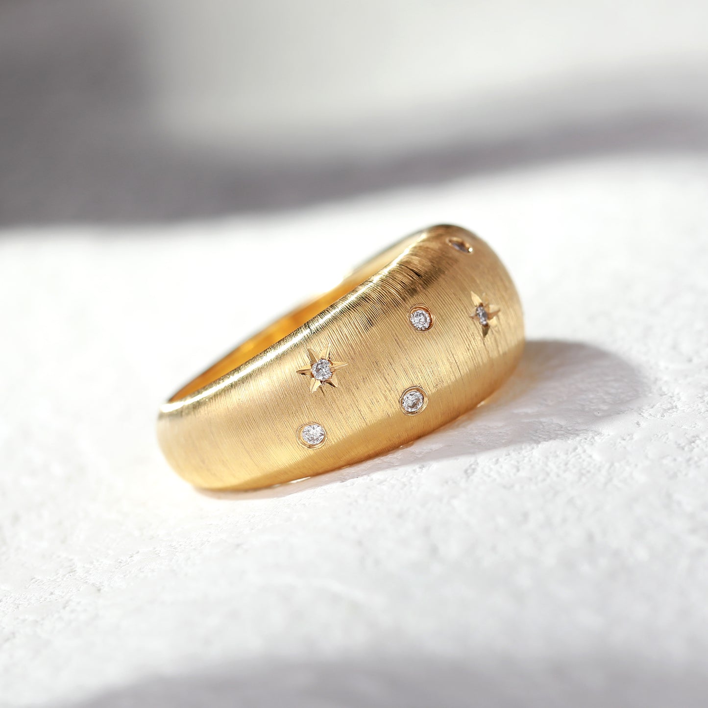 18K Gold Brushed Gold ring with diamond