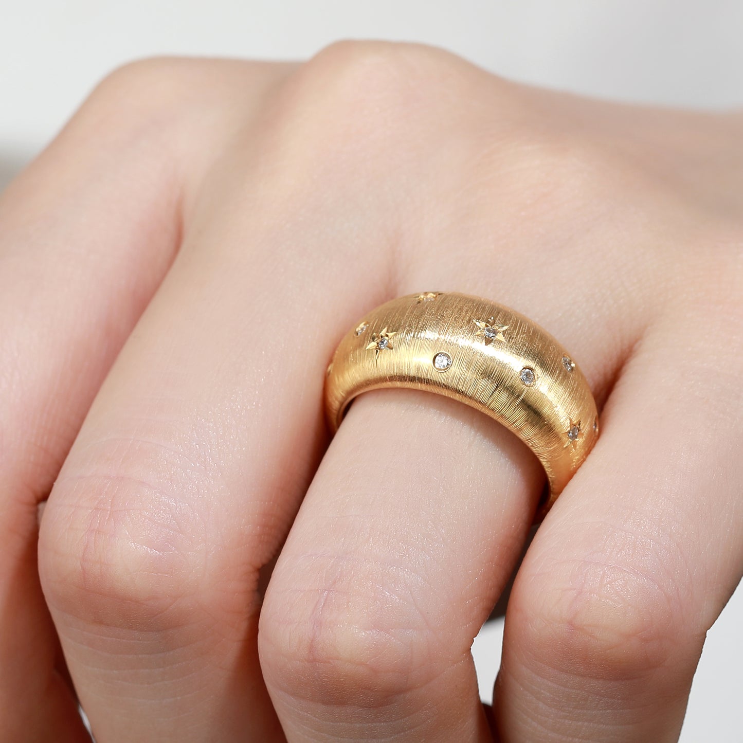 18K Gold Brushed Gold ring with diamond